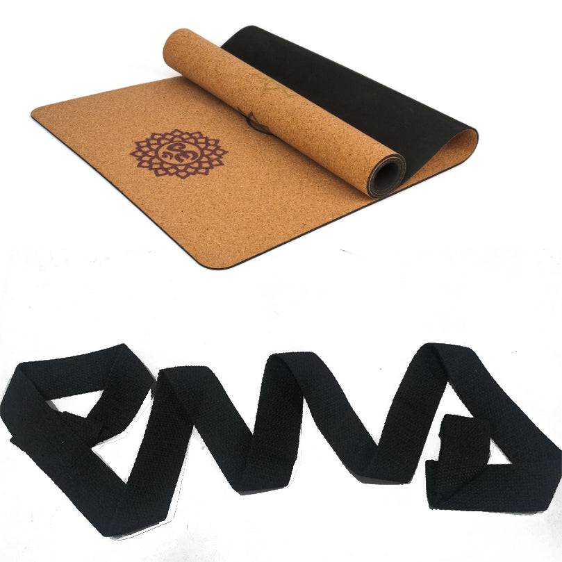 Seven-chakra cork yoga mat shown with a black carrying strap.