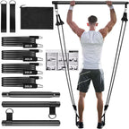Full Body Resistance Bar with black resistance bands, bar sections and accessories, shown in use for a standing exercise.