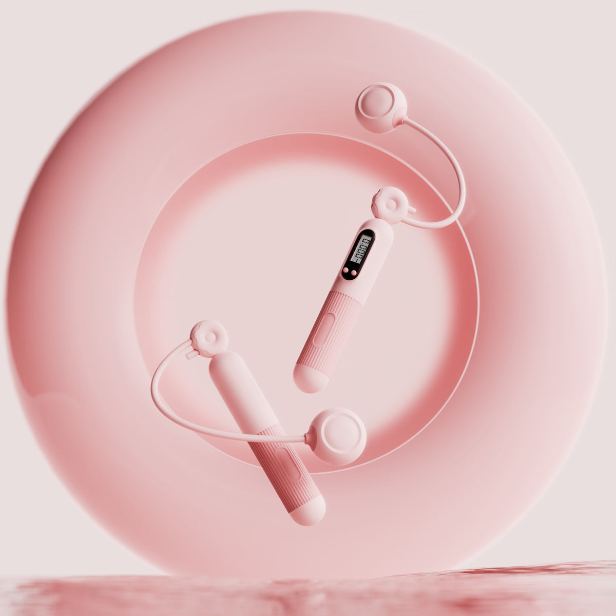 Pink digital jump rope handles with cordless ball attachments.