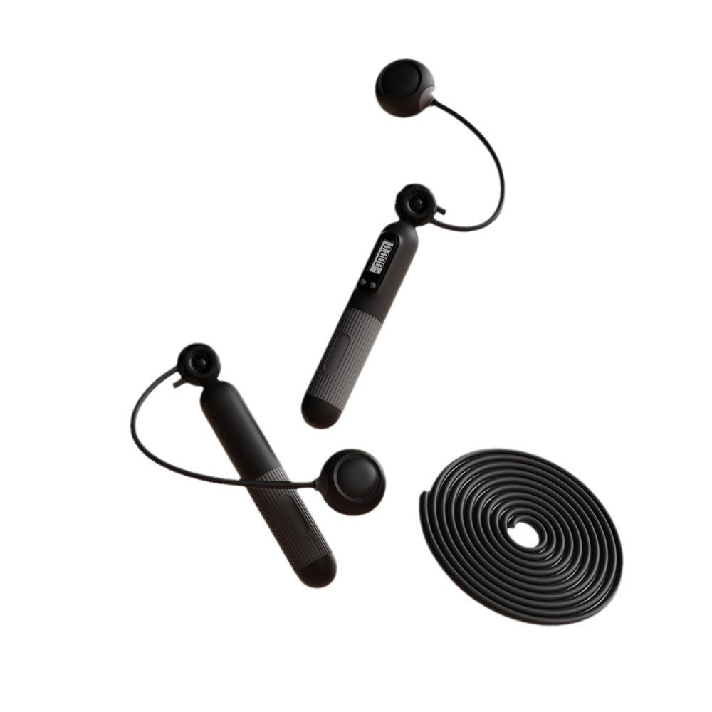 Black digital jump rope set with full-length rope and cordless attachments on white.
